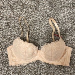 Size 70D cream underwire unlined bra.
